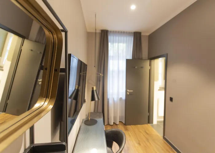Отель Munich Rooms Hotel 4*